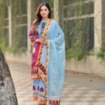 brightly patterned magenta and brown lawn three-piece suit