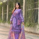 Pakistani style suit featuring embroidered three piece