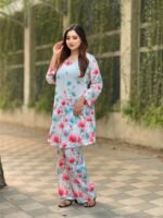 co-ord set in a light blue hue with pink and blue flower