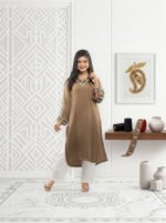 silk two-piece suit featuring vibrant neckline and sleeve embroidery
